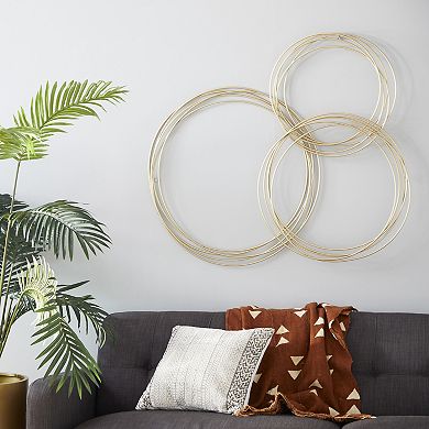 CosmoLiving by Cosmopolitan Circle Wall Decor