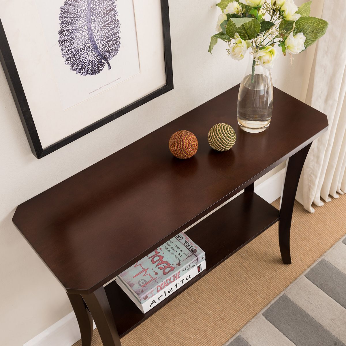Console hall stand with shelf close-up showing dark wood finish.