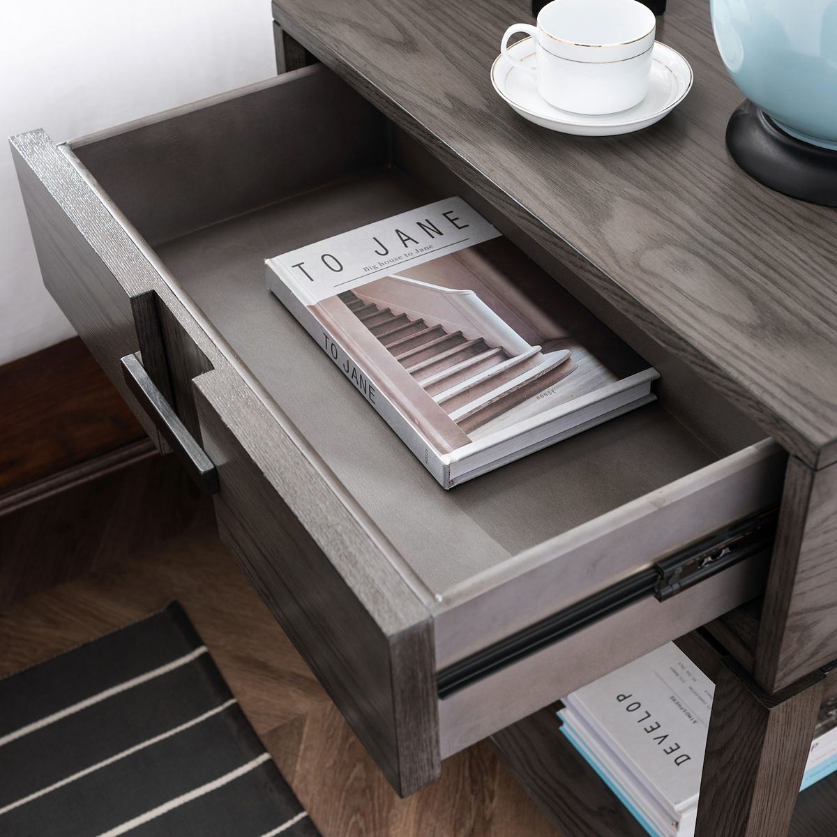 Nightstand drawer front and open drawer showing full-extension wood drawer interior