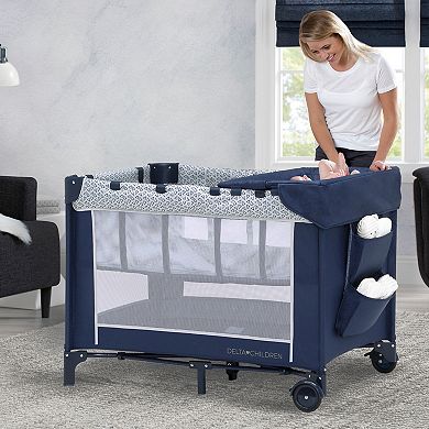 Delta Children LX Deluxe Portable Baby Play Yard With Removable Bassinet and Changing Table