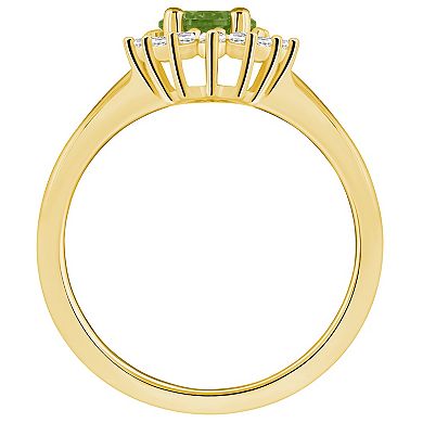 Alyson Layne 14k Gold Peridot & 1/4 Carat T.W. Diamond Halo Ring