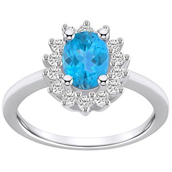 Alyson Layne 14k White Gold Oval Cut Blue Topaz & 1/3 Carat T.W. Diamond Halo Ring