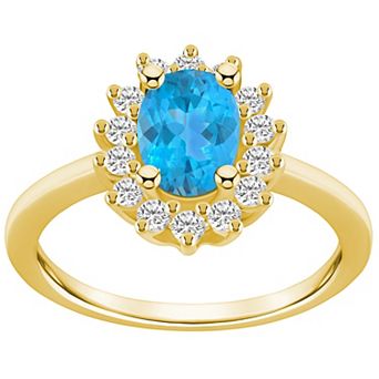 Alyson Layne 14k Gold Oval Cut Blue Topaz & 1/3 Carat T.W. Diamond Halo Ring