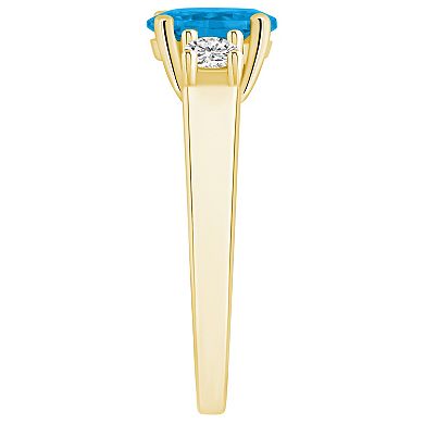 Alyson Layne 14k Gold Oval Cut Blue Topaz & 1/4 Carat T.W. Diamond Ring