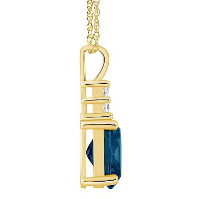 Alyson Layne 14k Gold Oval London Blue Topaz & 1/6 Carat T.W. Diamond Pendant Necklace