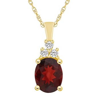 Alyson Layne 14k Gold Oval Garnet & 1/6 Carat T.W. Diamond Pendant Necklace