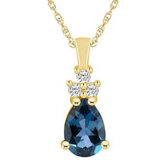 Alyson Layne 14k Gold Pear Shape London Blue Topaz & 1/6 Carat T.W. Diamond Pendant Necklace