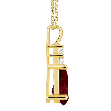 Alyson Layne 14k Gold Pear Shape Garnet & 1/6 Carat T.W. Diamond Pendant Necklace