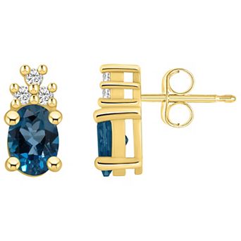 Alyson Layne 14k Gold Oval London Blue Topaz & 1/7 Carat T.W. Diamond Earrings