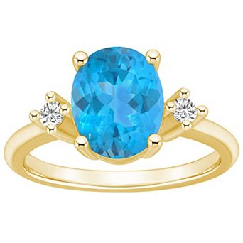 Alyson Layne 14k Gold Oval Blue Topaz & 1/10 Carat T.W. Diamond Ring