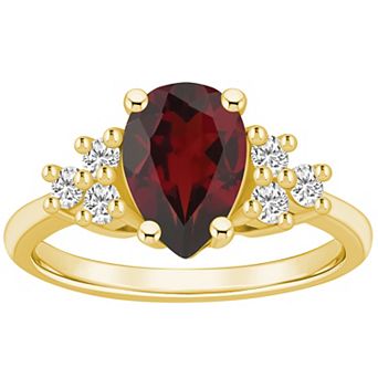 Alyson Layne 14k Gold Pear Shape Garnet & 1/3 Carat T.W. Diamond Ring