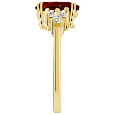Alyson Layne 14k Gold Pear Shape Garnet & 1/3 Carat T.W. Diamond Ring