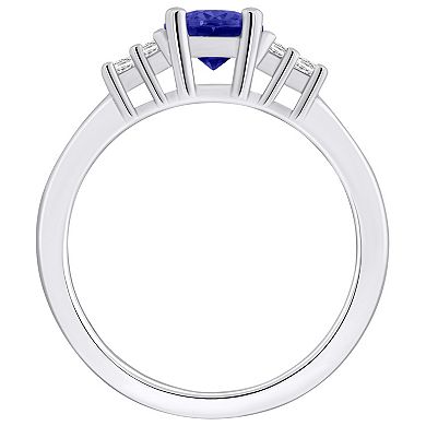 Alyson Layne 14k White Gold Oval Tanzanite & 1/5 Carat T.W. Diamond Ring
