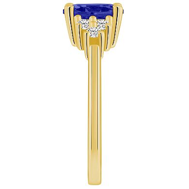 Alyson Layne 14k Gold Oval Tanzanite & 1/5 Carat T.W. Diamond Ring