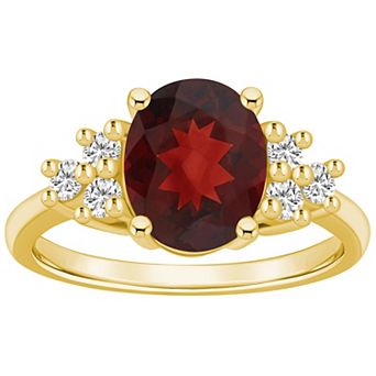 Alyson Layne 14k Gold Oval Garnet & 1/3 Carat T.W. Diamond Ring