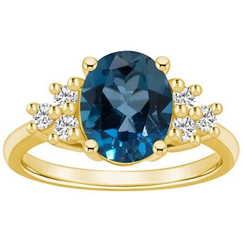 Alyson Layne 14k Gold Oval London Blue Topaz & 1/3 Carat T.W. Diamond Ring