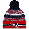 Youth New Era Navy/Red New England Patriots 2021 NFL Sideline Sport Pom Cuffed Knit Hat