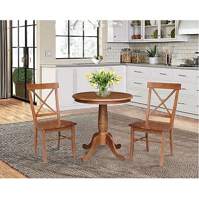International Concepts Round Pedestal Dining Table & X-Back Dining Chair 3-piece Set