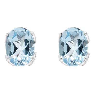 Alyson Layne 14k Gold Oval Sky Blue Topaz Stud Earrings