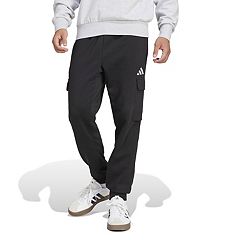 adidas Sportswear ESSENTIALS TAPERED CUFF PANTS - Tracksuit bottoms -  legend ivy/khaki 