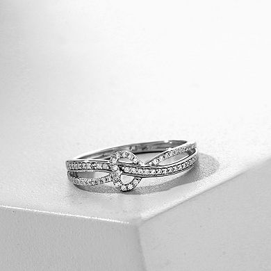 DeCouer Sterling Silver 1/6 Carat T.W. Diamond Heart Crisscross Ring