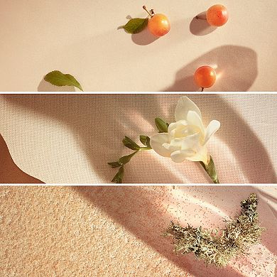 Nomade Eau de Parfum with Freesia Flower, Cherry Plum & Oak Moss