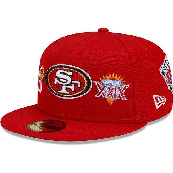 A San Francisco 49ers fan sports a Super Bowl ring hat and holds a