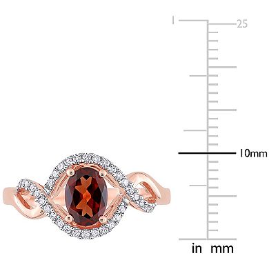 Stella Grace 10k Rose Gold Garnet & 1/6 Carat T.W. Diamond Halo Engagement Ring