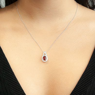 Sterling Silver 1/10 Carat T.W. Diamond & Garnet Oval Pendant