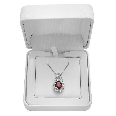 Sterling Silver 1/10 Carat T.W. Diamond & Garnet Oval Pendant