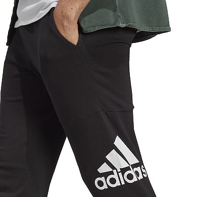 Men's adidas Essentials Badge of Sport Jersey Tapered Pants