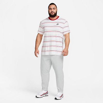 Nike woven tapered pants hotsell