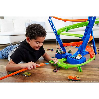 Hot Wheels Track Set and 1:64 Scale Toy Car, Spiral Race Track with Motorized Booster