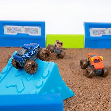 Monster Jam Mini World Finals Monster Dirt Arena with 2lbs Kinetic Sand and 6 Exclusive Mini Trucks