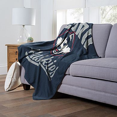 The Northwest UConn Huskies Alumni Silk-Touch Throw Blanket