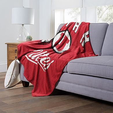 The Northwest Utah Utes Alumni Silk-Touch Throw Blanket