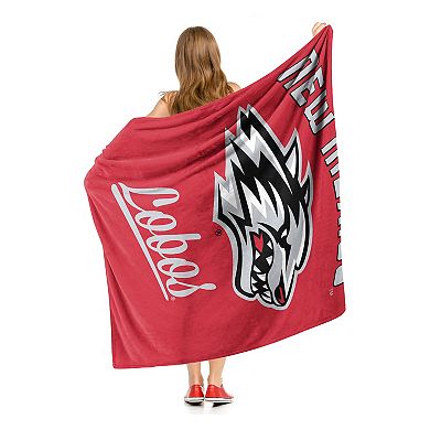 The Northwest New Mexico Lobos Alumni Silk-Touch Throw Blanket