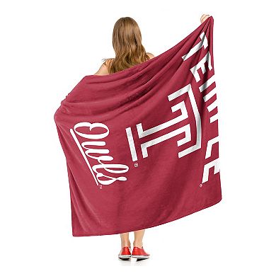 The Northwest Temple Owls Alumni Silk-Touch Throw Blanket