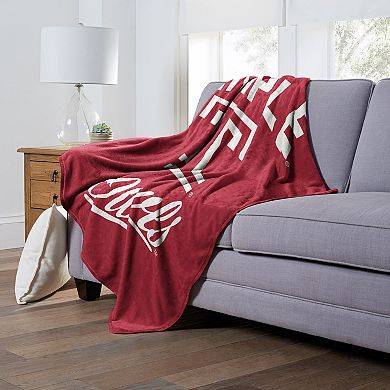 The Northwest Temple Owls Alumni Silk-Touch Throw Blanket