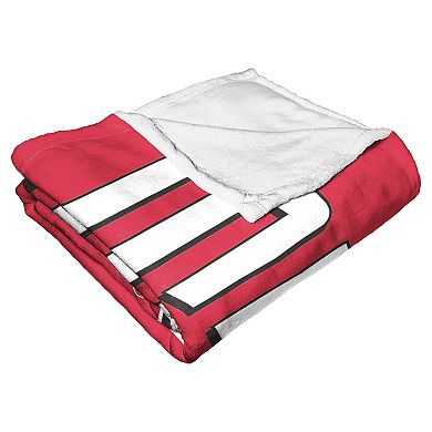 The Northwest Miami RedHawks Alumni Silk-Touch Throw Blanket