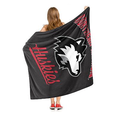 The Northwest Northern Illinois Huskies Alumni Silk-Touch Throw Blanket