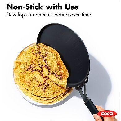 OXO Obsidian Pre-Seasoned Carbon Steel 10-in. Induction Crepe Pan with Removable Silicone Handle Holder