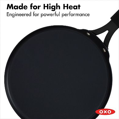 OXO Obsidian Pre-Seasoned Carbon Steel 10-in. Induction Crepe Pan with Removable Silicone Handle Holder