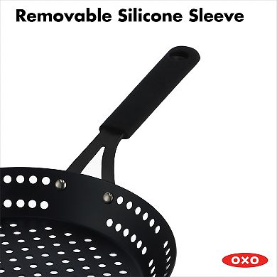 OXO Obsidian Pre-Seasoned Carbon Steel 12-in. Frypan with Holes for Grilling with Removable Silicone Handle Holder