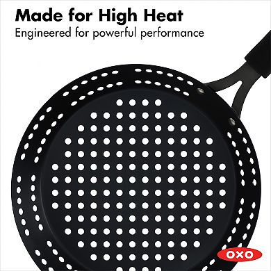OXO Obsidian Pre-Seasoned Carbon Steel 12-in. Frypan with Holes for Grilling with Removable Silicone Handle Holder