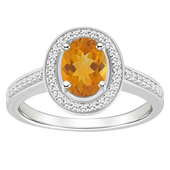 Celebration Gems Sterling Silver 8 mm x 6 mm Oval Gemstone & 1/5 Carat T.W. Diamond Halo Ring