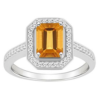 Celebration Gems Sterling Silver 8 mm x 6 mm Emerald Cut Gemstone & 1/5 Carat T.W. Diamond Halo Ring
