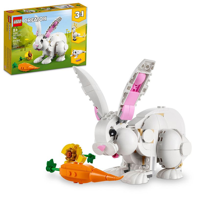 white LEGO rabbit with a carrot and LEGO box in the background