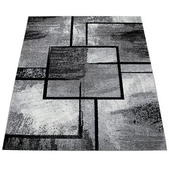 Black White Area Rug with Geometric Pattern and Modern Paint Effect