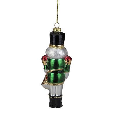 5.25" Green Red and Gold Nutcracker With Drum Glass Christmas Ornament